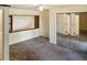 This bedroom features a ceiling fan and a mirrored closet sliding door at 925 Fenton Ln # 18, Lakeland, FL 33809