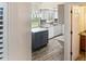 Bright kitchen with granite counters, stainless steel appliances, and wood-look flooring at 925 Fenton Ln # 18, Lakeland, FL 33809
