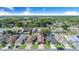 Aerial view of the neighborhood, featuring mature trees and well-maintained homes at 1523 Mariner Rd, Lakeland, FL 33803