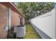 Exterior view of side yard and fenced boundary at 1523 Mariner Rd, Lakeland, FL 33803