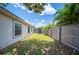 Fenced backyard with a storage shed, offering privacy and space for outdoor activities and storage at 1081 Sunshine Sw Way, Winter Haven, FL 33880