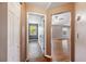 Hallway showcasing the home's floor plan, leading to the bedrooms and living areas at 1081 Sunshine Sw Way, Winter Haven, FL 33880