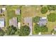 Aerial view of home, the lot and neighborhood in a suburban setting at 113 W Juliana Way, Auburndale, FL 33823