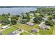 Aerial shot of a home with a large yard near a lake at 113 W Juliana Way, Auburndale, FL 33823
