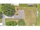 Bird's eye view of home highlighting its roof, backyard and relationship to surrounding properties at 113 W Juliana Way, Auburndale, FL 33823