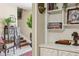 Inviting entryway with tile floors, staircase, glass display cabinet, and stylish decor at 1210 Heidi S Ln, Lakeland, FL 33813