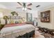 Spacious main bedroom featuring a ceiling fan and classic decor at 1210 Heidi S Ln, Lakeland, FL 33813