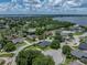 Lovely single Gathering home with verdant landscaping and dark roof; lakeside community at 128 Melissa Trl, Auburndale, FL 33823