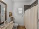 Modern bathroom with granite countertop and tiled shower at 128 Melissa Trl, Auburndale, FL 33823