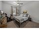 Bedroom featuring a ceiling fan, natural light and exercise bike at 128 Melissa Trl, Auburndale, FL 33823