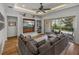 Bright living area featuring sliding glass doors leading to the outdoor patio at 128 Melissa Trl, Auburndale, FL 33823