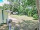 Large backyard with mature trees offering plenty of shade and privacy at 132 Kinstle Ave, Auburndale, FL 33823