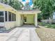 Carport and driveway for off-street parking, offering protection and easy access to the home at 132 Kinstle Ave, Auburndale, FL 33823