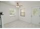 Dining area features tile floors, white walls, windows and a door leading outside at 132 Kinstle Ave, Auburndale, FL 33823