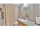 Cozy bathroom featuring a vanity, toilet, and shower at 15345 Angus Rd, Polk City, FL 33868