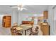 Open concept dining area adjacent to kitchen offers ample space for entertaining and casual dining at 15345 Angus Rd, Polk City, FL 33868