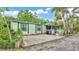 Inviting single-story home with mature landscaping and spacious parking at 15345 Angus Rd, Polk City, FL 33868
