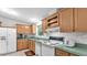 The kitchen has lots of cabinets and a gas range at 15345 Angus Rd, Polk City, FL 33868