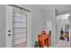Functional laundry area with storage, washer hook-ups, and access to utilities at 15345 Angus Rd, Polk City, FL 33868
