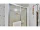 Bathroom with a shower that has sliding glass doors at 15345 Angus Rd, Polk City, FL 33868