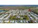 Aerial view of community with mature trees, and various homes at 1610 Reynolds Rd # 214, Lakeland, FL 33801