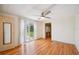 Comfortable bedroom featuring hardwood floors and ample natural light at 1610 Reynolds Rd # 214, Lakeland, FL 33801