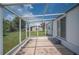 The screened patio offers a delightful view of the backyard and surrounding community at 1610 Reynolds Rd # 214, Lakeland, FL 33801