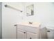 Bathroom features a single sink vanity and a toilet at 1720 Park Dr, Lakeland, FL 33803