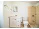 Bathroom features a walk-in shower and tiled floors at 1720 Park Dr, Lakeland, FL 33803