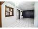 Bright living room boasts tile floors and unique wooden design details at 1720 Park Dr, Lakeland, FL 33803