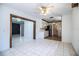 Spacious living room features tile floors and access to the kitchen at 1720 Park Dr, Lakeland, FL 33803