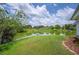 Beautiful backyard with lake access, providing a peaceful and picturesque setting at 2055 S Floral Ave # 245, Bartow, FL 33830