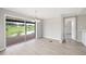 Dining room features sliding glass doors leading to a patio with a picturesque water view at 2055 S Floral Ave # 245, Bartow, FL 33830