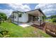 Charming home with covered patio, landscaped yard, and beautiful lakeside setting at 2055 S Floral Ave # 245, Bartow, FL 33830
