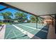 Covered shuffleboard courts with benches for relaxation, offering a fun and social recreational space at 2055 S Floral Ave # 245, Bartow, FL 33830