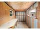 Versatile storage room with workbench, pegboard, and natural light at 2055 S Floral Ave # 245, Bartow, FL 33830