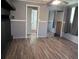 Bedroom featuring gray paint, laminate floors and closet at 2105 E Cherokee St, Bartow, FL 33830