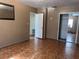 Bedroom with closet, multiple entries and patterned floor at 2105 E Cherokee St, Bartow, FL 33830