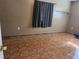 Bedroom with curtains and patterned floor at 2105 E Cherokee St, Bartow, FL 33830