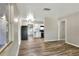 Open floorplan showcasing the living room, dining area, and kitchen at 215 W Valencia St, Lakeland, FL 33805