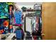 Organized walk-in closet with ample shelving and hanging space for clothes and accessories at 2208 Deerbrook Dr, Lakeland, FL 33811