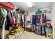 Walk-in closet with shelving for ample storage of clothing and personal belongings at 2208 Deerbrook Dr, Lakeland, FL 33811