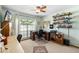 Bright office with desk, shelving, and natural light at 2208 Deerbrook Dr, Lakeland, FL 33811