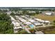 Aerial view of condos shows a community with a pool and water access at 2219 Starboard Rd, Winter Haven, FL 33881
