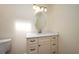 Bathroom with modern vanity, mirror, and stylish lighting fixtures above the sink at 2219 Starboard Rd, Winter Haven, FL 33881