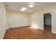 Bright bedroom with wood floors, a ceiling fan, recessed lights, and a view to the hallway with closet at 2219 Starboard Rd, Winter Haven, FL 33881