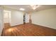 Bedroom with hardwood floors, ceiling fan, ensuite bathroom and washer and dryer at 2219 Starboard Rd, Winter Haven, FL 33881