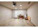 The garage shows a water heater, a workbench and a service door to the exterior at 2219 Starboard Rd, Winter Haven, FL 33881