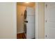 Convenient laundry area featuring stacked washer and dryer, maximizing space efficiency at 2219 Starboard Rd, Winter Haven, FL 33881