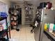 Spacious kitchen offering stainless steel appliances and tiled flooring at 225 W Orange St, Lake Alfred, FL 33850